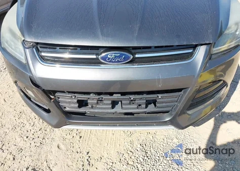 2016 Ford Escape Titanium z USA, uszkodzony, nr VIN 1FMCU9J97GUC20513